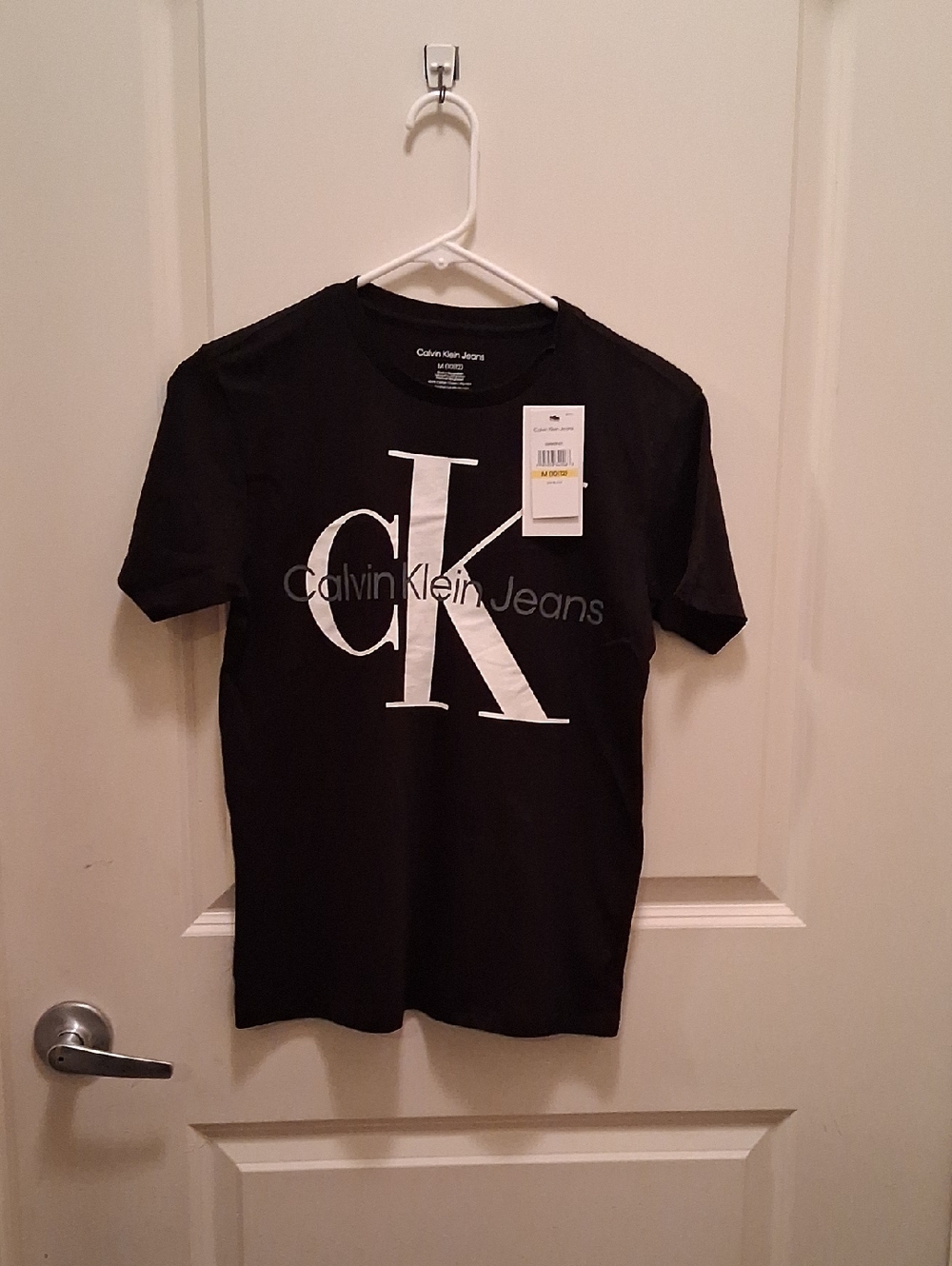 Calvin Klein Jeans Kids Black T-Shirt with Large White CK Logo